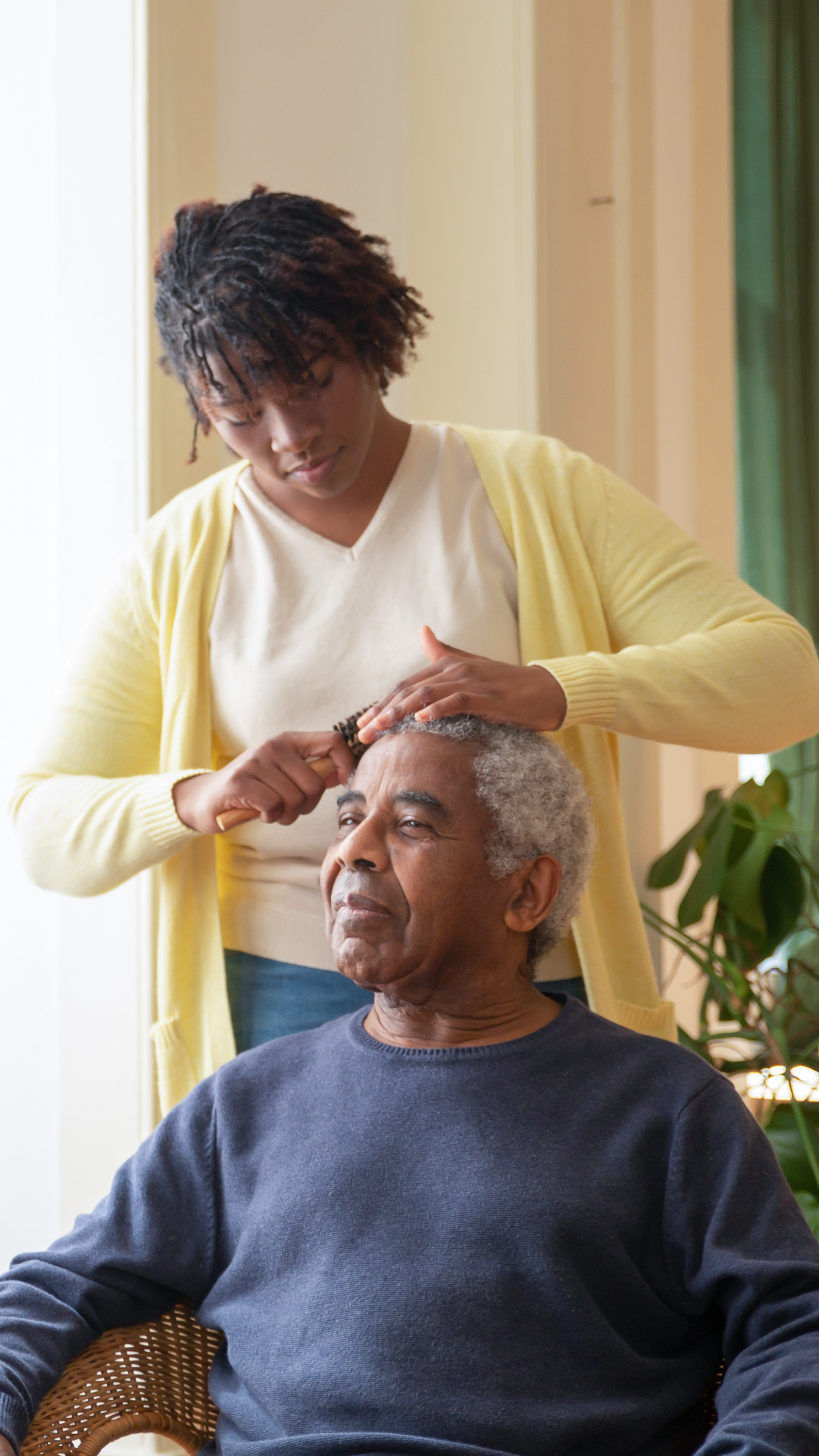 A Cova caregiver supporting someone they care for at home